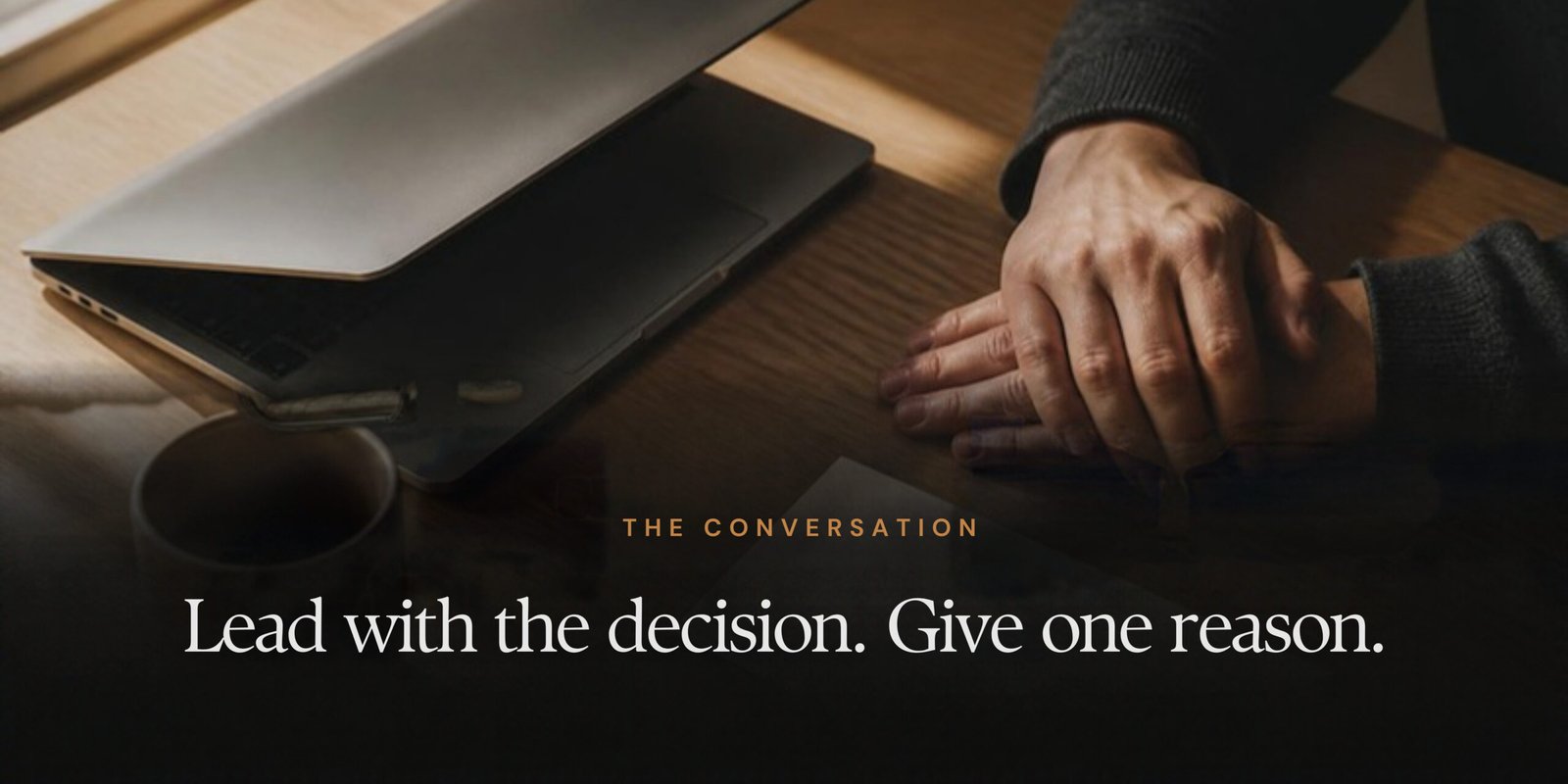 A calm desk with a laptop being closed, a printed letter and a pen, representing the decision to end a client relationship